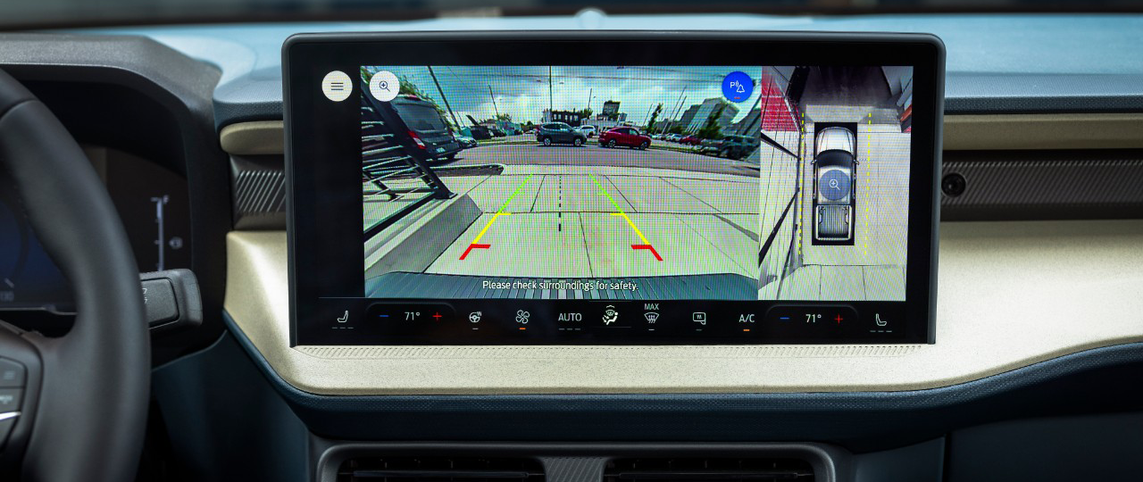 Ford Maverick infotainment screen showing the view from the backup camera with parking guidelines. 