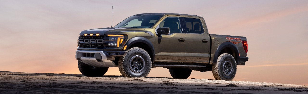 A Ford Super Duty King Ranch highlighting its powerful engine and comfortable interior while effortlessly towing a horse trailer.