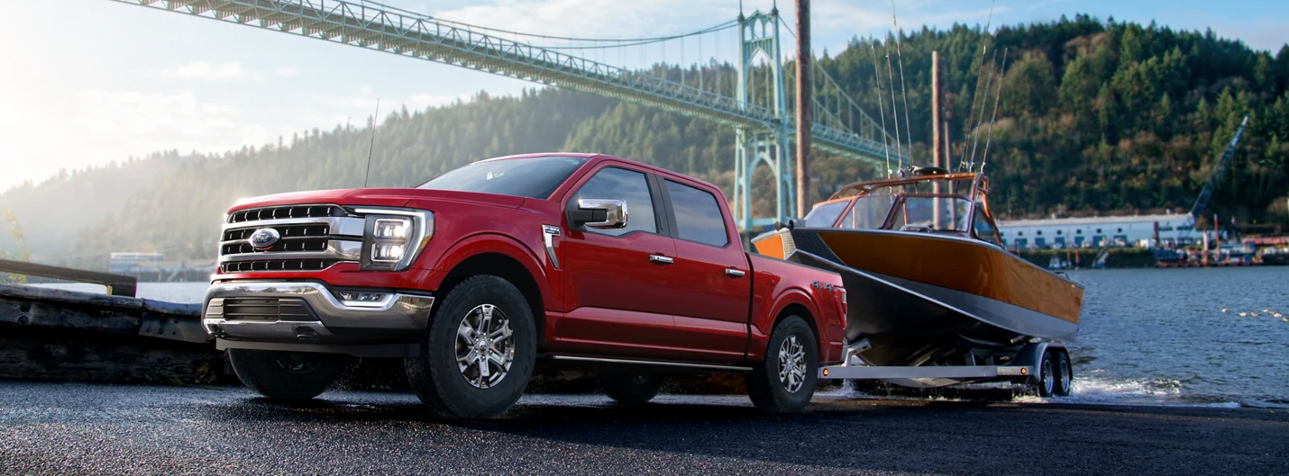 A 2023 Ford Explorer Timberline off-roading in a forest.